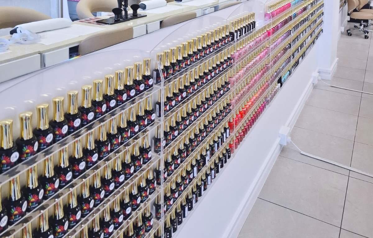 The salon's wall of gel polish colours